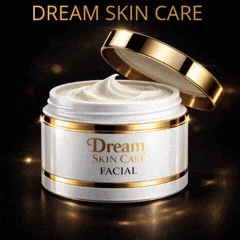 Pote branco com detalhes dourados do creme facial Dream Skin Care, aberto, com a tampa dourada apoiada ao lado e o creme branco visível