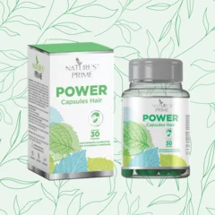 Pote e caixa do Power Caps Hair, da Nature's Prime, sobre fundo verde com folhas, com rótulo de 30 cápsulas