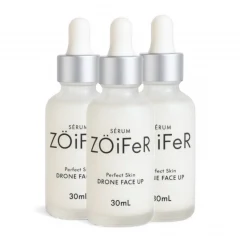 Três frascos brancos de sérum ZÖiFeR Drone Face Up de 30 ml, com conta-gotas e tampa prateada